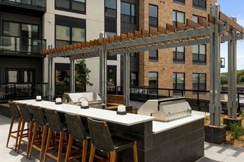 Outdoor kitchen and lounge area
